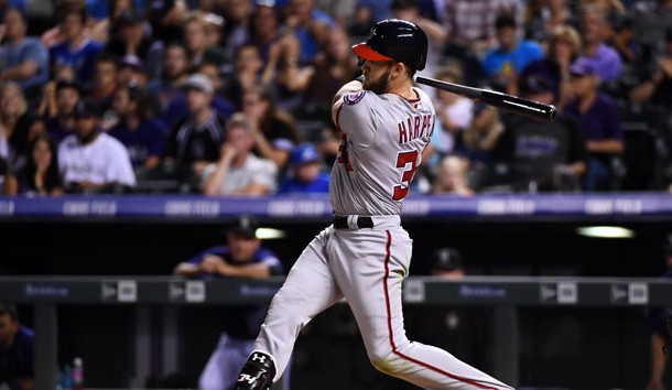 Aug 15, 2016; Denver, CO, USA; Washington Nationals right fielder Bryce Harper (34) hits an RBI double and the go ahead run in the seventh inning against the Colorado Rockies at Coors Field. The Nationals defeated the Rockies 5-4. Photo Credit: Ron Chenoy-USA TODAY Sports