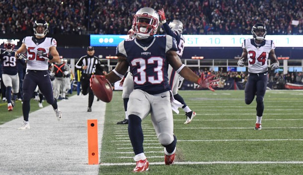 Jan 14, 2017; Foxborough, MA, USA; New England Patriots running back Dion Lewis (33)returns a kick for a touchdown against the Houston Texans during the first quarter in the AFC Divisional playoff game at Gillette Stadium. Photo Credit: James Lang-USA TODAY Sports