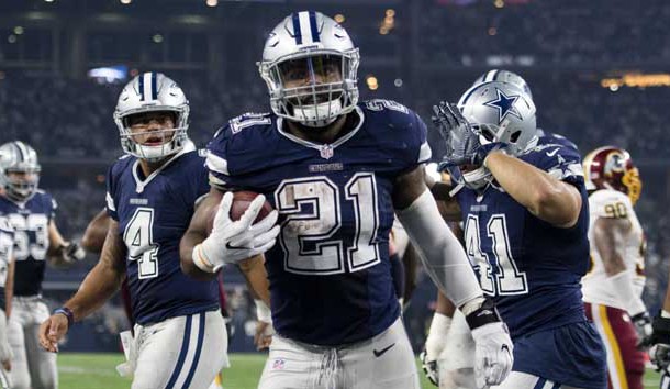 Nov 24, 2016; Arlington, TX, USA; Dallas Cowboys running back Ezekiel Elliott (21) scores a touchdown against the Washington Redskins during the second half at AT&T Stadium. The Cowboys defeat the Redskins 31-26. Photo Credit: Jerome Miron-USA TODAY Sports