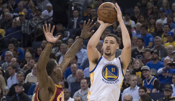 January 16, 2017; Oakland, CA, USA; Golden State Warriors guard Klay Thompson (11) shoots the basketball against Cleveland Cavaliers guard DeAndre Liggins (14) during the fourth quarter at Oracle Arena. The Warriors defeated the Cavaliers 126-91. Photo Credit: Kyle Terada-USA TODAY Sports