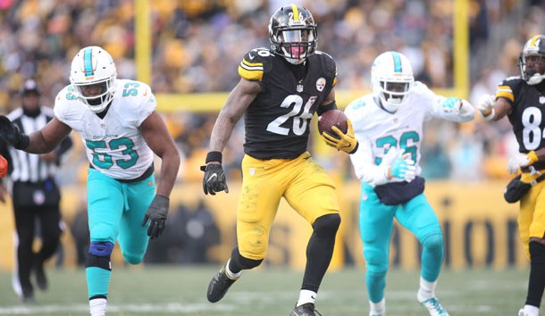 Jan 8, 2017; Pittsburgh, PA, USA; Pittsburgh Steelers running back Le'Veon Bell (26) carries the ball against the Miami Dolphins during the second half in the AFC Wild Card playoff football game at Heinz Field. Photo Credit: Charles LeClaire-USA TODAY Sports