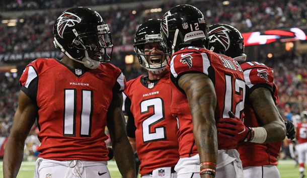 Jan 1, 2017; Atlanta, GA, USA; Atlanta Falcons wide receiver Mohamed Sanu (12) reacts with wide receiver Julio Jones (11) and quarterback Matt Ryan (2) after catching a touchdown pass against the New Orleans Saints during the first half at the Georgia Dome. Photo Credit: Dale Zanine-USA TODAY Sports