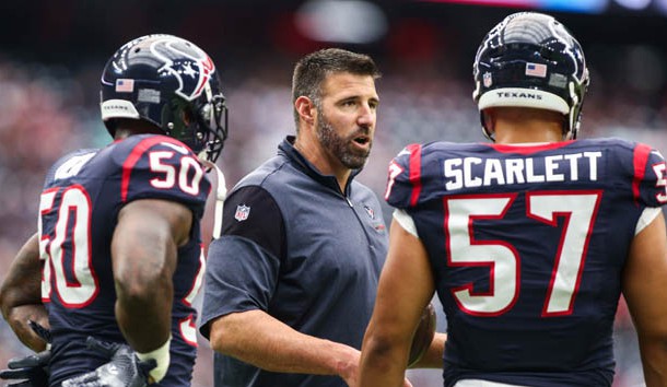 Sep 18, 2016; Houston, TX, USA; Houston Texans linebackers coach Mike Vrabel talks with inside linebacker Akeem Dent (50) and linebacker Brennan Scarlett (57) before a game against the Kansas City Chiefs at NRG Stadium. Photo Credit: Troy Taormina-USA TODAY Sports