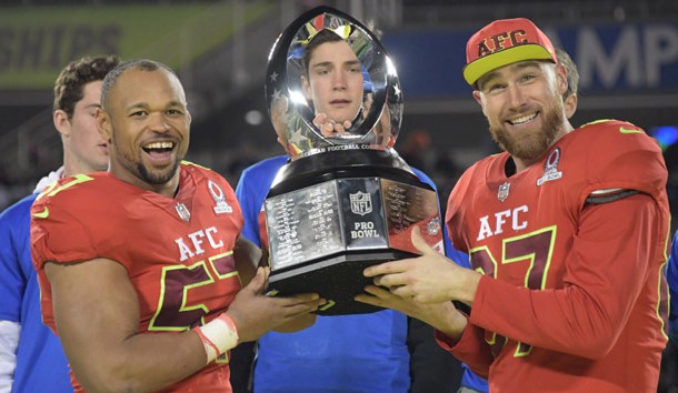 Jan 29, 2017; Orlando, FL, USA; AFC linebacker Lorenzo Alexander of the Buffalo Bills (57) and tight end Travis Kelce of the Kansas City Chiefs (87) hold the Pro Bowl trophy after the 2017 Pro Bowl at Camping World Stadium. The AFC defeated the NFC 20-13. Photo Credit: Kirby Lee-USA TODAY Sports