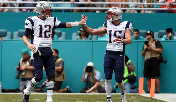Jan 1, 2017; Miami Gardens, FL, USA; New England Patriots wide receiver Chris Hogan (right) greets Patriots quarterback Tom Brady (left) after they scored a touchdown against Miami Dolphins during the first half at Hard Rock Stadium. Photo Credit: Steve Mitchell-USA TODAY Sports