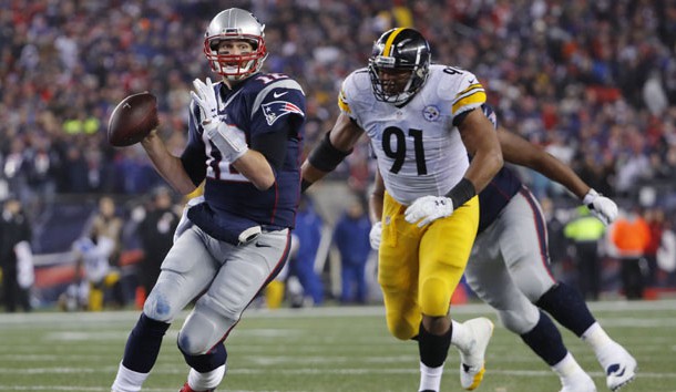 Jan 22, 2017; Foxborough, MA, USA; New England Patriots quarterback Tom Brady (12) throws a pass while pressured by Pittsburgh Steelers defensive end Stephon Tuitt (91) during the fourth quarter in the 2017 AFC Championship Game at Gillette Stadium. Photo Credit: Winslow Townson-USA TODAY Sports