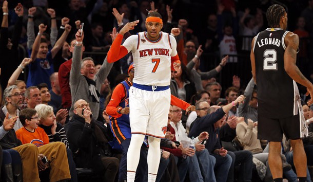 Feb 12, 2017; New York, NY, USA; New York Knicks forward Carmelo Anthony (7) reacts after hitting a three-point basket during the second half against the San Antonio Spurs at Madison Square Garden. Photo Credit: Adam Hunger-USA TODAY Sports