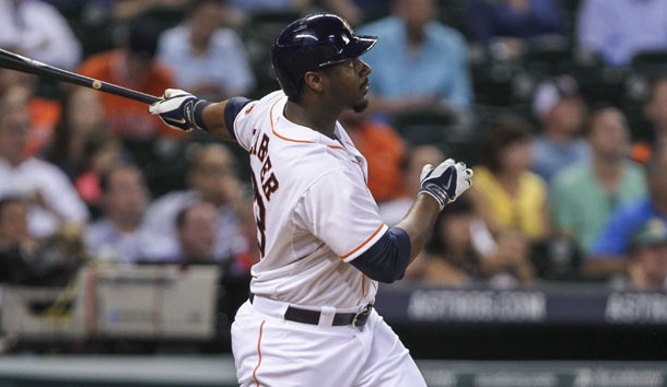 Aug 12, 2014; Houston, TX, USA; Houston Astros designated hitter Chris Carter (23) hits a home run during the fifth inning against the Minnesota Twins at Minute Maid Park. Photo Credit: Troy Taormina-USA TODAY Sports
