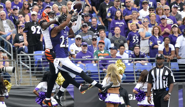 Sep 27, 2015; Baltimore, MD, USA; Baltimore Ravens cornerback Jimmy Smith (22) intercepts the ball in front of Cincinnati Bengals wide receiver A.J. Green (18) during the third quarter at M&T Bank Stadium. Photo Credit: Tommy Gilligan-USA TODAY Sports