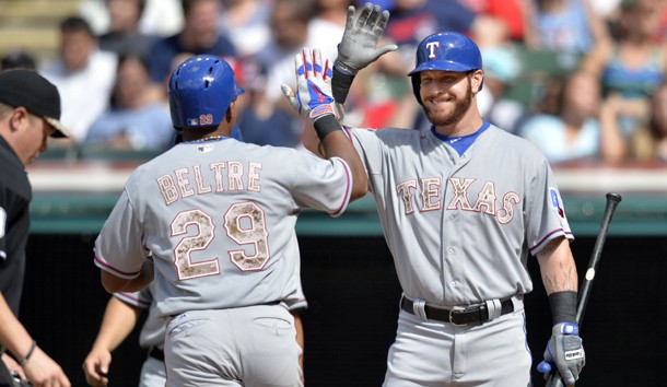 May 25, 2015; Cleveland, OH, USA; Texas Rangers third baseman Adrian Beltre (29) celebrates his solo home run with left fielder Josh Hamilton (32) in the first inning against the Cleveland Indians at Progressive Field. Photo Credit: David Richard-USA TODAY Sports
