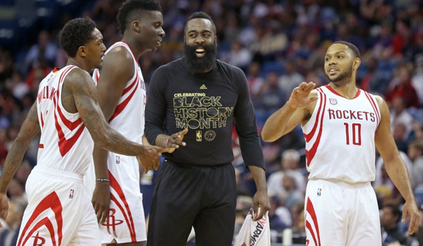 Feb 23, 2017; New Orleans, LA, USA; Houston Rockets guard James Harden (center) talks with guard Lou Williams (12) and center Clint Capela (15) and guard Eric Gordon (10) in the second half against the New Orleans Pelicans at the Smoothie King Center. The Rockets won 129-99. Photo Credit: Chuck Cook-USA TODAY Sports