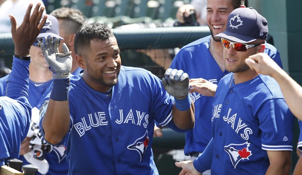 Mar 26, 2017; Lakeland, FL, USA;  Toronto Blue Jays second baseman Alex Monsalve (left) gets a pat on the back after a home run during the ninth inning of a MLB spring training baseball game against the Detroit Tigers at Joker Marchant Stadium. The Blue Jays won 4-3. Photo Credit: Reinhold Matay-USA TODAY Sports