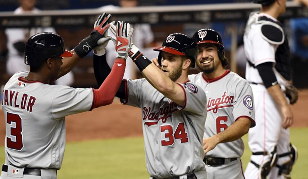 Apr 19, 2016; Miami, FL, USA; Washington Nationals right fielder Bryce Harper (center) is greeted by Nationals center fielder Michael Taylor (left) after Harper hit a grand slam during the seventh inning against the Miami Marlins at Marlins Park. Photo Credit: Steve Mitchell-USA TODAY Sports
