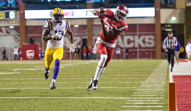 Nov 12, 2016; Fayetteville, AR, USA; Arkansas Razorbacks wide receiver Dominique Reed (3) makes the reception and scores a touchdown as LSU Tigers cornerback Tre'Davious White (18) trails the play during the second quarter of the game at Donald W. Reynolds Razorback Stadium. Mandatory Credit: Brett Rojo-USA TODAY Sports