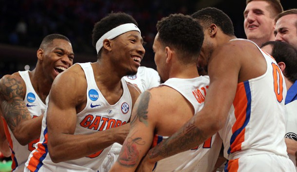 Mar 24, 2017; New York, NY, USA; The Florida Gators celebrates with guard Chris Chiozza (11) after he hit the game winning the shot to beat the Wisconsin Badgers during overtime in the semifinals of the East Regional of the 2017 NCAA Tournament at Madison Square Garden. Photo Credit: Brad Penner-USA TODAY Sports