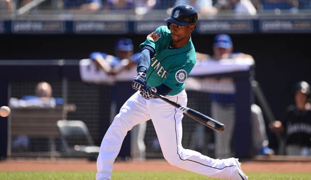 Mar 10, 2017; Peoria, AZ, USA; Seattle Mariners center fielder Jarrod Dyson (1) swings at a pitch against the Chicago Cubs during the first inning at Peoria Stadium. Photo Credit: Joe Camporeale-USA TODAY Sports