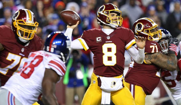 Jan 1, 2017; Landover, MD, USA; Washington Redskins quarterback Kirk Cousins (8) throws the ball as New York Giants defensive end Owa Odighizuwa (58) chases in the third quarter at FedEx Field. The Giants won 19-10. Photo Credit: Geoff Burke-USA TODAY Sports