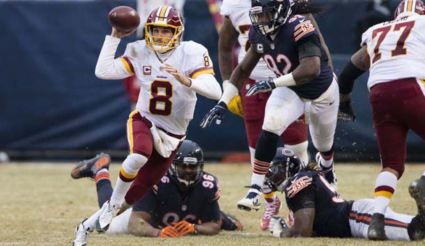 Dec 24, 2016; Chicago, IL, USA; Washington Redskins quarterback Kirk Cousins (8) carries the ball against the Chicago Bears during the second half at Soldier Field. The Redskins won 41-21. Photo Credit: Jerome Miron-USA TODAY Sports