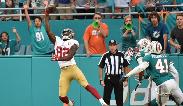 Nov 27, 2016; Miami Gardens, FL, USA; San Francisco 49ers wide receiver Torrey Smith (82) makes a one handed catch for a touchdown in front of Miami Dolphins cornerback Byron Maxwell (41) during the second half at Hard Rock Stadium. The Dolphins won 31-24. Photo Credit: Steve Mitchell-USA TODAY Sports