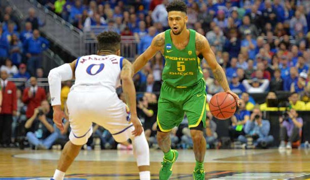 Mar 25, 2017; Kansas City, MO, USA; Oregon Ducks guard Tyler Dorsey (5) works around Kansas Jayhawks guard Frank Mason III (0) during the first half in the finals of the Midwest Regional of the 2017 NCAA Tournament at Sprint Center. Photo Credit: Denny Medley-USA TODAY Sports