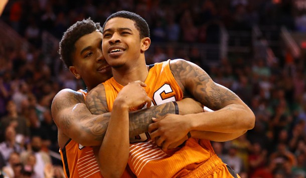 Mar 5, 2017; Phoenix, AZ, USA; Phoenix Suns guard Tyler Ulis (right) is lifted up by teammate Marquese Chriss as they celebrate Ulis buzzerbeater against the Boston Celtics at Talking Stick Resort Arena. The Suns defeated the Celtics 109-106. Photo Credit: Mark J. Rebilas-USA TODAY Sports