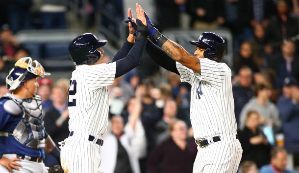 Apr 13, 2017; Bronx, NY, USA; New York Yankees left fielder Aaron Hicks (right) is congratulated by centerfielder Jacoby Ellsbury (22) after hitting a two run home during the seventh inning at Yankee Stadium. Photo Credit: Andy Marlin-USA TODAY Sports