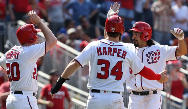 Apr 30, 2017; Washington, DC, USA; Washington Nationals third baseman Anthony Rendon (6) celebrates with Nationals second baseman Daniel Murphy (20) and Nationals right fielder Bryce Harper (34) after hitting a three-run home run against the New York Mets in the fourth inning at Nationals Park. Photo Credit: Geoff Burke-USA TODAY Sports