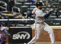 Kemp's two-run double gives Braves 12-inning win