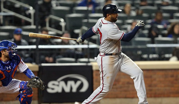 Apr 5, 2017; New York City, NY, USA; Atlanta Braves left fielder Matt Kemp (27) follows through on a two run double against the New York Mets during the twelfth inning at Citi Field. Photo Credit: Brad Penner-USA TODAY Sports