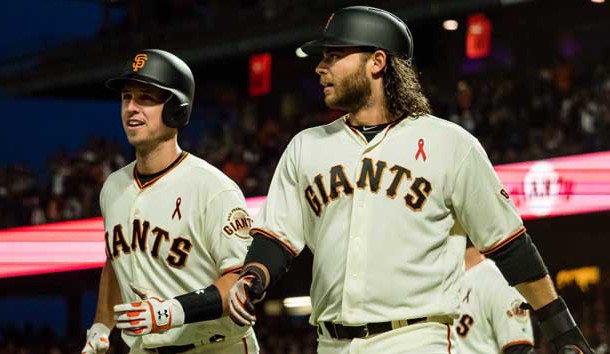 May 15, 2017; San Francisco, CA, USA; San Francisco Giants catcher Buster Posey (28) and shortstop Brandon Crawford (35) after scoring runs against the Los Angeles Dodgers during the fourth inning at AT&T Park. Photo Credit: Kelley L Cox-USA TODAY Sports