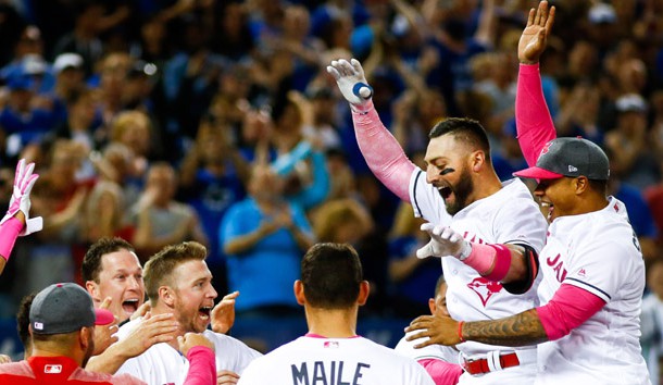May 14, 2017; Toronto, Ontario, CAN; Toronto Blue Jays center fielder Kevin Pillar (11) celebrates with teammates after hitting a walk off home run against the Seattle Mariners during the ninth inning at Rogers Centre. Photo Credit: Kevin Sousa-USA TODAY Sports