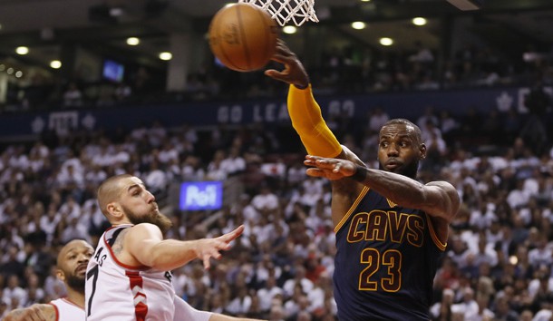 May 5, 2017; Toronto, Ontario, CAN; Cleveland Cavaliers forward LeBron James (23) passes the ball as Toronto Raptors center Jonas Valanciunas (17) looks on during the first half of game three of the second round of the 2017 NBA Playoffs at Air Canada Centre. Photo Credit: John E. Sokolowski-USA TODAY Sports