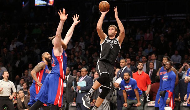Mar 21, 2017; Brooklyn, NY, USA; Brooklyn Nets center Brook Lopez (11) shoots and makes the game winning buzzer beater over Detroit Pistons center Aron Baynes (12) during the fourth quarter at Barclays Center. Photo Credit: Brad Penner-USA TODAY Sports
