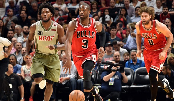 Nov 10, 2016; Miami, FL, USA; Chicago Bulls guard Dwyane Wade (3) dribbles the ball past Miami Heat forward Justise Winslow (20) during the first half at American Airlines Arena. Photo Credit: Steve Mitchell-USA TODAY Sports