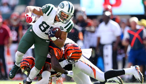 Sep 11, 2016; East Rutherford, NJ, USA; New York Jets wide receiver Eric Decker (87) catches a pass against Cincinnati Bengals safety Shawn Williams (36) and safety George Iloka (43) during the fourth quarter at MetLife Stadium. Photo Credit: Brad Penner-USA TODAY Sports