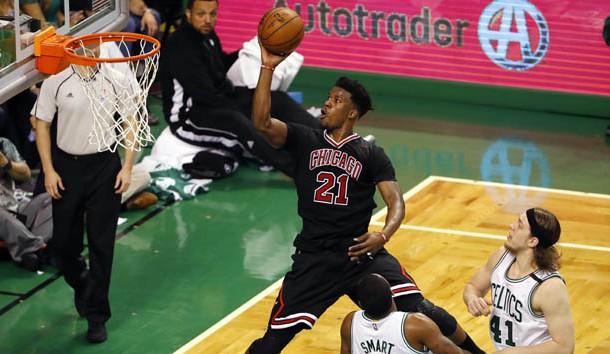 Apr 16, 2017; Boston, MA, USA; Chicago Bulls forward Jimmy Butler (21) goes to the basket past Boston Celtics guard Marcus Smart (36) and center Kelly Olynyk (41) during the third quarter in game one of the first round of the 2017 NBA Playoffs at TD Garden. Photo Credit: Winslow Townson-USA TODAY Sports