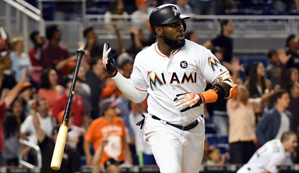 Jun 19, 2017; Miami, FL, USA; Miami Marlins left fielder Marcell Ozuna (13) hits the game winning RBI single to defeat the Washington Nationals at Marlins Park. Photo Credit: Steve Mitchell-USA TODAY Sports