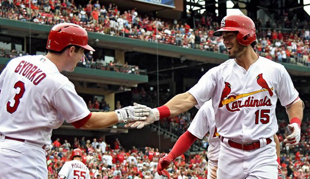 Jun 26, 2017; St. Louis, MO, USA; St. Louis Cardinals left fielder Randal Grichuk (15) is congratulated by third baseman Jedd Gyorko (3) after hitting a two run home run off of Cincinnati Reds relief pitcher Austin Brice (not pictured) during the fourth inning at Busch Stadium. Photo Credit: Jeff Curry-USA TODAY Sports
