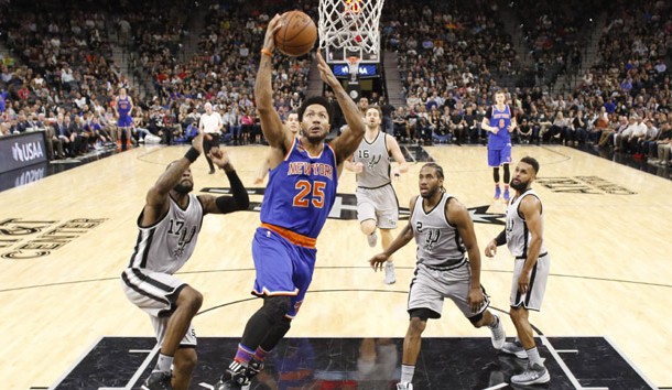 Mar 25, 2017; San Antonio, TX, USA; New York Knicks point guard Derrick Rose (25) drives to the basket past San Antonio Spurs shooting guard Jonathon Simmons (17) during the second half at AT&T Center. The Spurs won 106-98. Photo Credit: Soobum Im-USA TODAY Sports