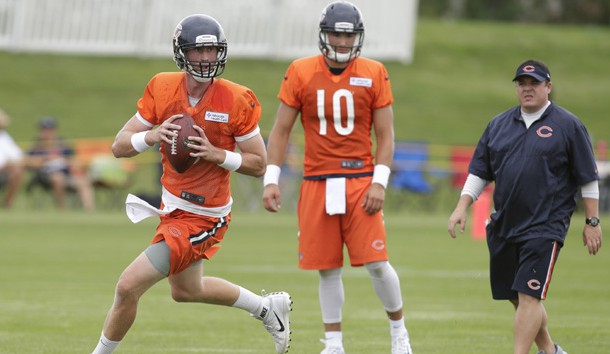 Jul 27, 2017; Bourbonnais, IL, USA; Chicago Bears quarterback Mike Glennon (8) rolls out in front of quarterback Mitchell Trubisky (10) during Training Camp at Olivet Nazarene University. Photo Credit: Erich Schlegel-USA TODAY Sports
