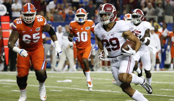 Dec 3, 2016; Atlanta, GA, USA; Alabama Crimson Tide defensive back Minkah Fitzpatrick (29) runs the ball for a touchdown during the first quarter of the SEC Championship college football game against the Florida Gators at Georgia Dome. Photo Credit: Jason Getz-USA TODAY Sports