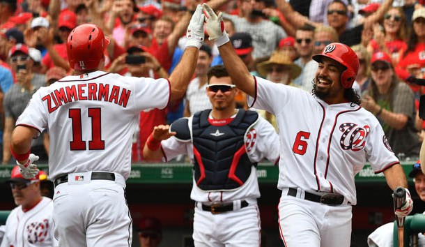 Jul 27, 2017; Washington, DC, USA; Washington Nationals first baseman Ryan Zimmerman (11) is congratulated by third baseman Anthony Rendon (6) after hitting a solo homer against the Milwaukee Brewers during the third inning at Nationals Park. Photo Credit: Brad Mills-USA TODAY Sports