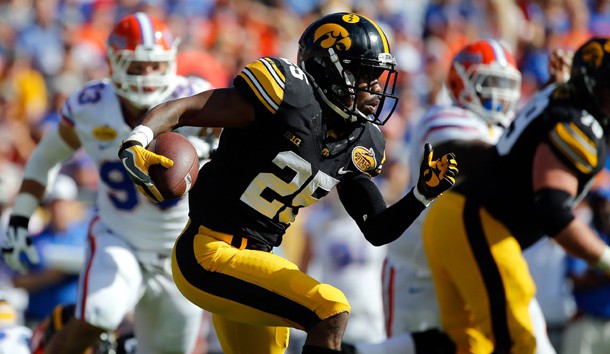 Jan 2, 2017; Tampa , FL, USA;  Iowa Hawkeyes running back Akrum Wadley (25) runs with the ball against the Florida Gators during the second quarter at Raymond James Stadium. Photo Credit: Kim Klement-USA TODAY Sports