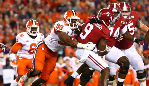 Jan 9, 2017; Tampa, FL, USA; Clemson Tigers defensive end Clelin Ferrell (99) tackles Alabama Crimson Tide running back Bo Scarbrough (9) in the 2017 College Football Playoff National Championship Game at Raymond James Stadium. Photo Credit: Mark J. Rebilas-USA TODAY Sports