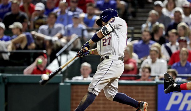 Jun 8, 2016; Arlington, TX, USA; Houston Astros second baseman Jose Altuve (27) hits a two rbi double during the seventh inning against the Texas Rangers at Globe Life Park in Arlington. Photo Credit: Kevin Jairaj-USA TODAY Sports