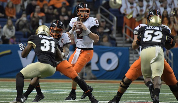 Dec 29, 2016; San Antonio, TX, USA; Oklahoma State Cowboys quarterback Mason Rudolph (2) throws a pass in the first quarter against the Colorado Buffaloes during the 2016 Alamo Bowl at Alamodome. Photo Credit: Kirby Lee-USA TODAY Sports