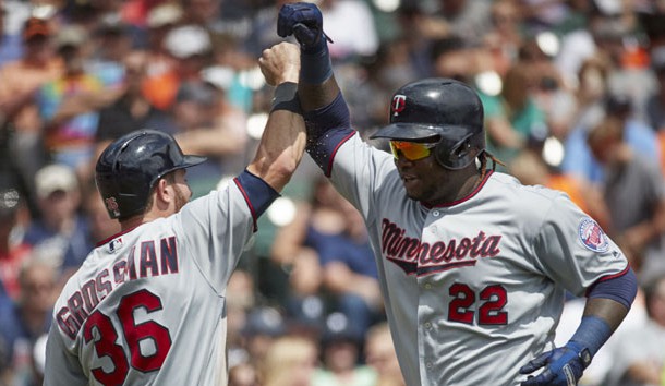 Aug 13, 2017; Detroit, MI, USA; Minnesota Twins first baseman Miguel Sano (22) receives congratulations from right fielder Robbie Grossman (36) after he hits a two run home run in the third inning against the Detroit Tigers at Comerica Park. Photo Credit: Rick Osentoski-USA TODAY Sports