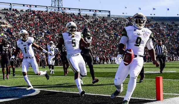 Dec 29, 2016; Birmingham, AL, USA; South Florida Bulls quarterback Quinton Flowers (9) scores a touchdown during the first quarter against the South Carolina Gamecocks in the 2016 Birmingham Bowl at Legion Field. Photo Credit: Shanna Lockwood-USA TODAY Sports