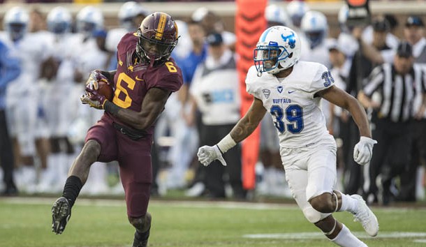 Aug 31, 2017; Minneapolis, MN, USA; Minnesota Golden Gophers wide receiver Tyler Johnson (6) rushes with the ball after making a catch as Buffalo Bulls cornerback Cameron Lewis (39) plays defense in the first half at TCF Bank Stadium. Photo Credit: Jesse Johnson-USA TODAY Sports