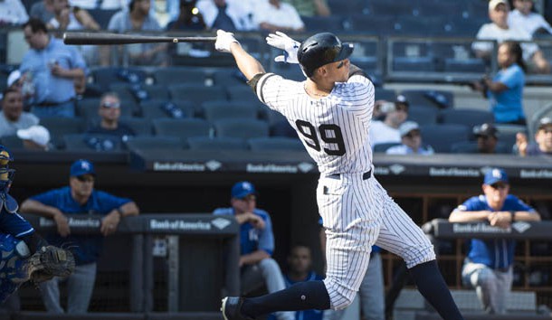 Sep 25, 2017; Bronx, NY, USA; New York Yankees right fielder Aaron Judge (99) hits his 50th home run against the Kansas City Royals during the seventh inning of the game at Yankee Stadium. Photo Credit: Gregory J. Fisher-USA TODAY Sports